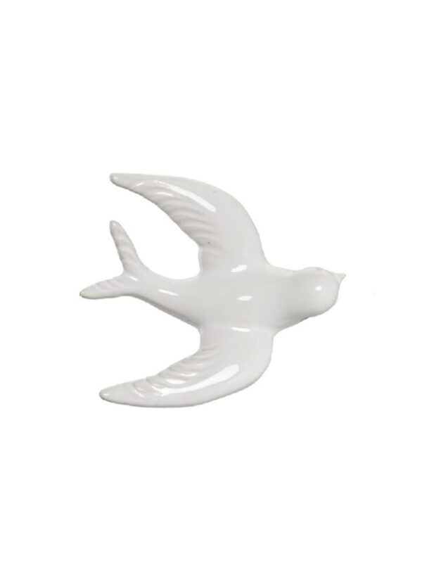 Golondrina pared porcelana blanca